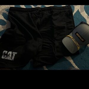 New Caterpillar brand mens hat/cap and XL black cotton shorts bundle
